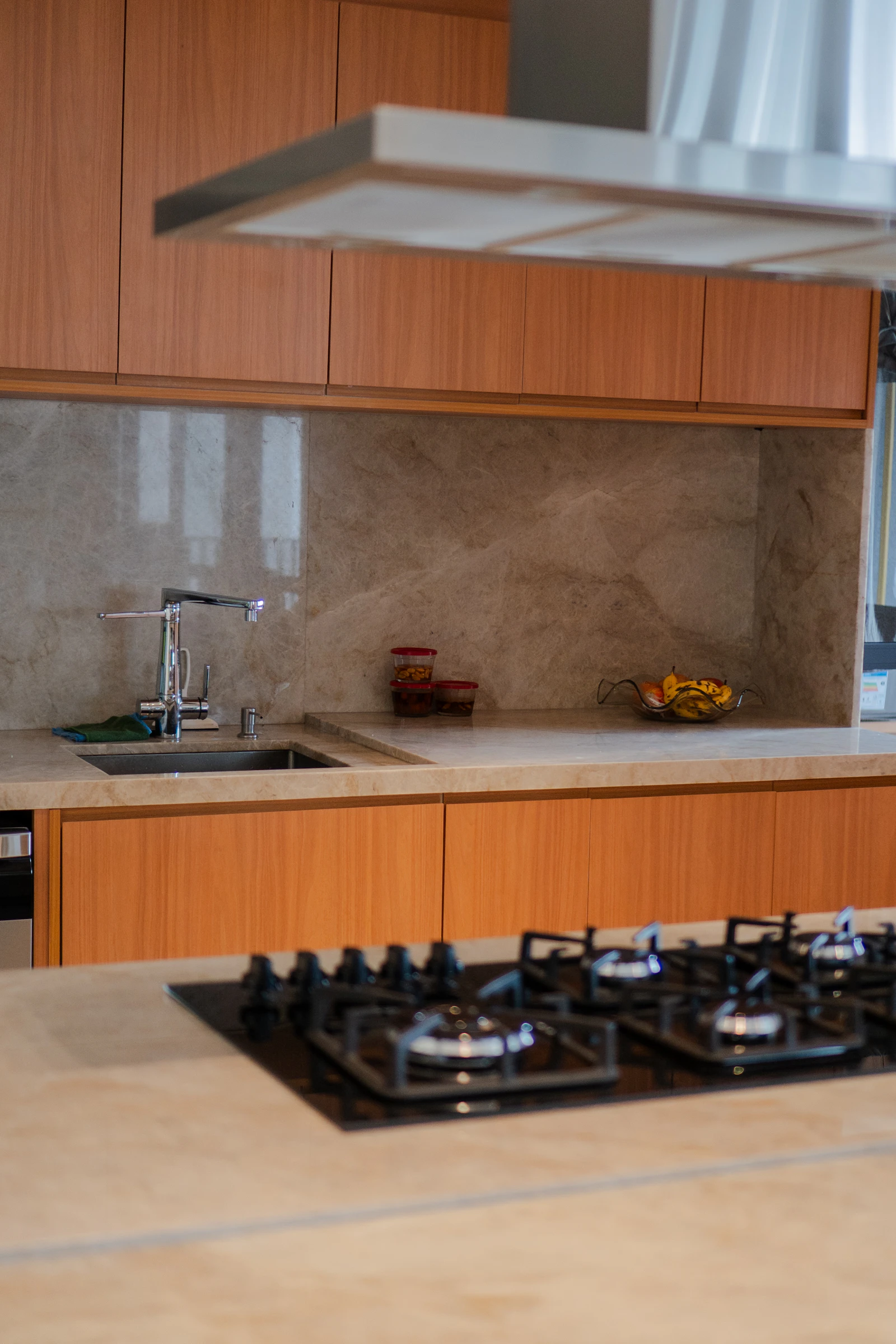 Kitchen worktop with a sink and gas stove