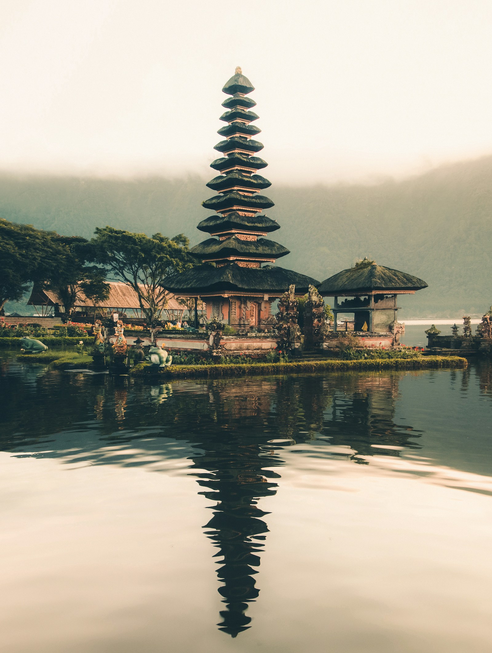 Lotus pond and temple setting used as an illustrative Ubud Water Palace visitor guide image